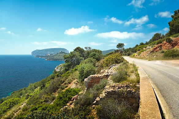 Scenic road leading to Capo Caccio in Sardinia.