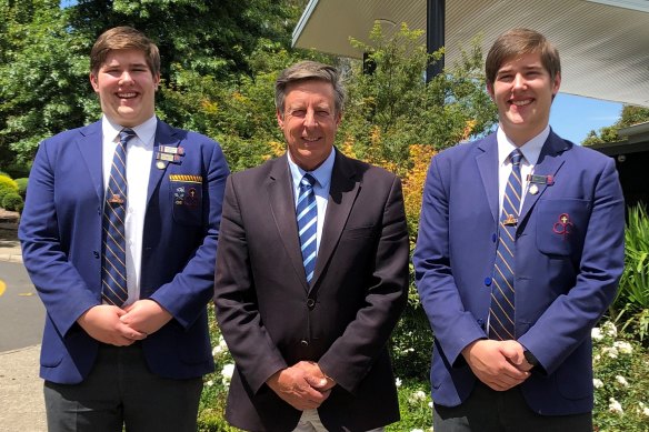 Connor Ibbotson (left) and Luke Ibbotson with principal Cameron Herbert. 