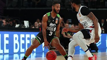 Slick hands: John Roberson doubles under against the 36ers.