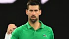 Novak Djokovic celebrates his semi-final win.