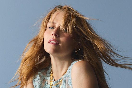 Lucy Folk “Eos” dress and “Mantra” pants. Prada shoes. Lucy Folk jewellery.