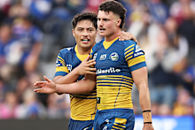 Ronald Volkman and Jonah Pezet celebrate the Eels’ win on Sunday.