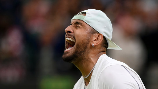 Nick Kyrgios celebrates beating Stefanos Tsitsipas during their third round match at Wimbledon.