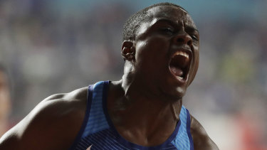Coleman reacts after winning gold in the men's 100m final at the World Athletics Championships in Doha, Qatar.