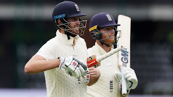 England's Dom Sibley, left, and Ben Stokes shared an unbeaten century partnership on day one in Manchester.