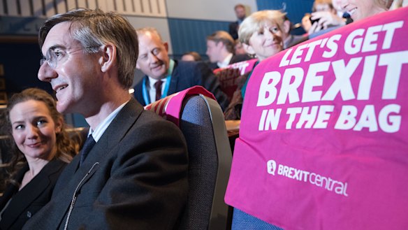 Jacob Rees-Mogg, British Conservative MP, right, sits next to his wife Helena de Chair during the Conservative Party annual conference.
