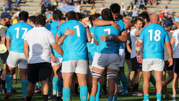 Jubilant Uruguay celebrate their 30-27 defeat of Fiji at the Rugby World Cup.