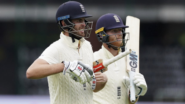 England's Dom Sibley, left, and Ben Stokes shared an unbeaten century partnership on day one in Manchester.