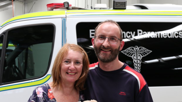 Jenny with her husband Urs Birrer at the Beenleigh Ambulance Station after meeting with paramedics who saved his life in March 2019.