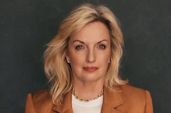 Christine wears Ginger & Smart jacket and pants, her own blouse, Saint Laurent shoes, and David Yurman jewellery.