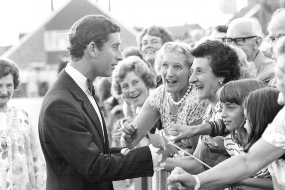 As the prince of Wales, Charles was  comfortable getting close to the crowd.