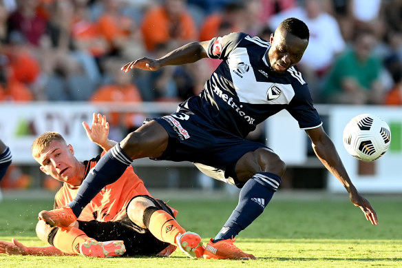 Victory’s Adama Traore, right, is tackled. 