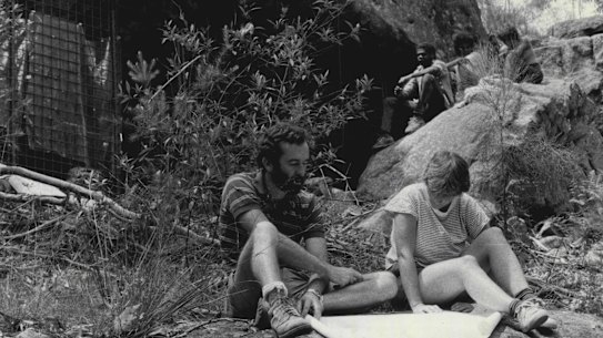 Rock art conservationists in 1985 outside Bull Cave nestled in a patch of bushland near Campbelltown,