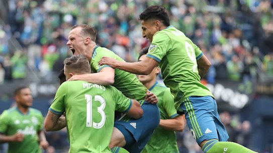 Seattle celebrate Kelvin Leerdam's goal during the MLS Cup final.