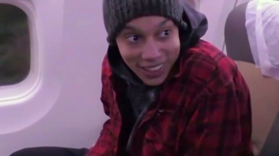 Brittney Griner sits in the plane as she flies to Abu Dhabi to be exchanged for Russian citizen Viktor Bout, in Russia, on Friday.