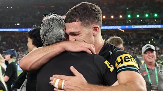 Emotional embrace: Ivan Cleary with son Nathan after Sunday’s grand final win.