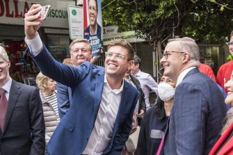 Labor candidate for Bennelong Jerome Laxale takes a selfie with Opposition Leader Anthony Albanese in Eastwood.