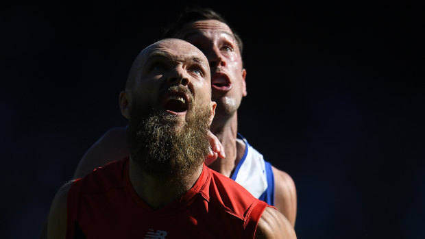 Eyes up: Melbourne's Max Gawn and North's Todd Goldstein get set for a ruck challenge.
