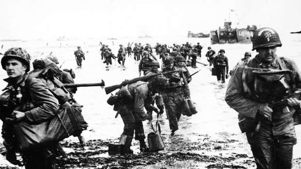 The invasion begins ... US troops come ashore at Normandy.