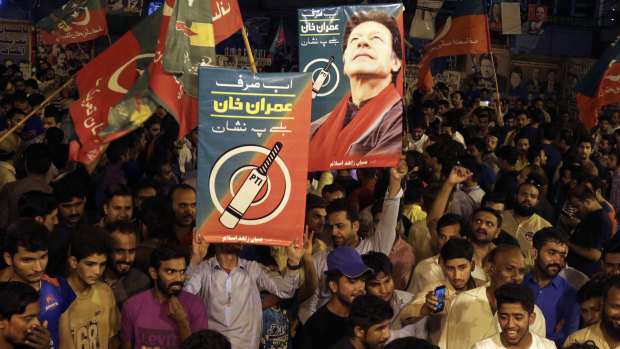 Supporters of Imran Khan celebrate reports of his victory in Islamabad, the capital of Pakistan.