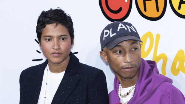 Pharrell Williams with his wife Helen Lasichanh at the photo call for the Chanel Pharrell Williams Collection launch event in Seoul, South Korea.
