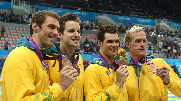 Matt Targett, James Magnussen, 
Christian Sprenger and Hayden Stoeckel pose with their bronze medals in London eight years ago.