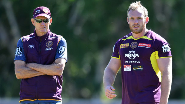 Broncos coach Wayne Bennett (left) and Matt Lodge at a Broncos training session at Clive Berghofer Field in Brisbane on Monday.