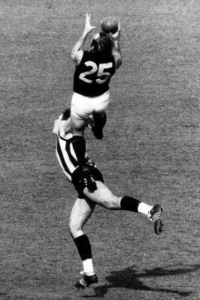 You beauty: Carlton's Alex Jesaulenko takes a famous mark in the third quarter of the 1970 Grand Final against Collingwood.