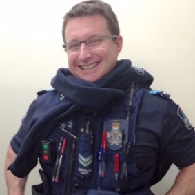 Senior Constable Brett Forte in his police uniform, with a few humorous additions.