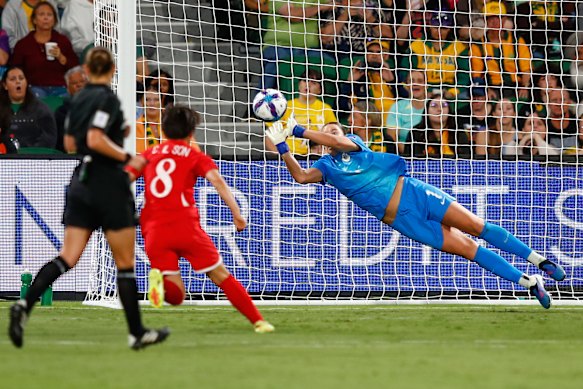 Makenzie Arnold makes a save.