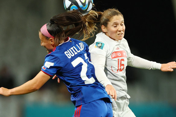 Philippines’ Katrina Guillou in action with Switzerland’s Sandrine Mauron in Dunedin.
