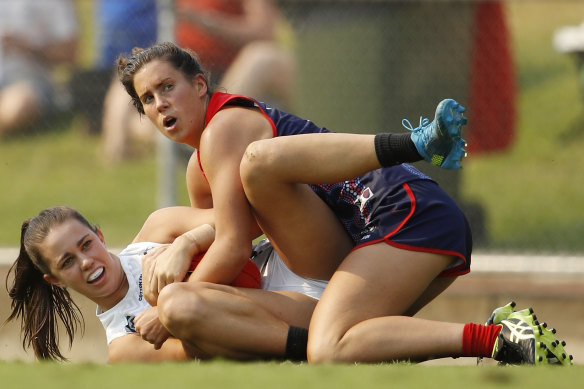 Libby Birch (pictured laying a tackle on Chloe Molloy) is expecting a higher quality of football in season seven of AFLW.