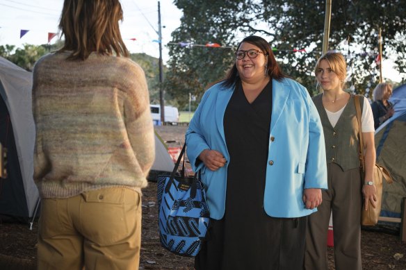 Steph Tisdell (middle) plays a teal independent mayor, Shauna Johnson, who terrorises her new staffer, Oly (Nathalie Morris, right), in the fourth season of Bump.  
