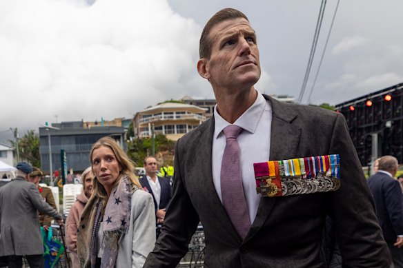 Ben Roberts-Smith and his partner Sarah Matulin attend dawn service at Currumbin on Anzac day. 