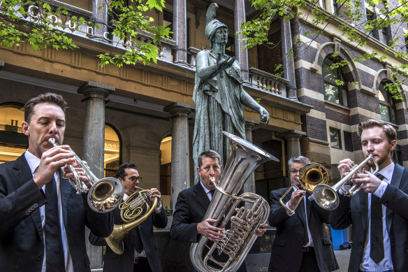State and local governments will spend millions to get people back to the CBD, including funding Sydney Symphony Orchestra performances on the street. 