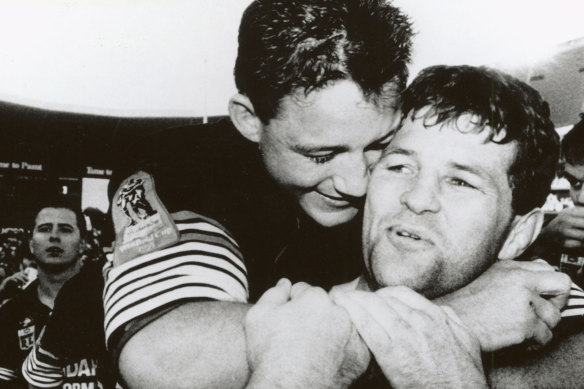Two tries and a grand final win in his last game ... an elated Royce Simmons is embraced by Mark Geyer at full-time in the 1991 grand final.