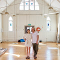 Matilda Riek and Brad Cooper inside the 19th-century church that will become August in November.