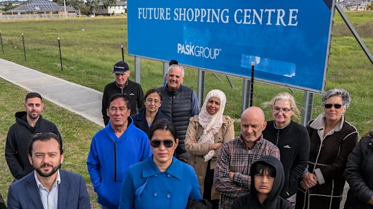 Unhappy residents at the corner of Montenegro Road and Venezia Promenade, Greenvale. The empty land in Greenvales chockablock estates will be turned into more housing, despite a billboard sitting in an empty paddock for years promising a new shopping centre. Residents say it’s a case of false advertising and they want the plans shelved. 6th May 2022, The Age news Picture by JOE ARMAO