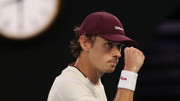 Alex de Minaur celebrates winning a point.