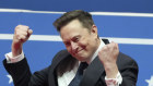 Elon Musk arrives to speak at an indoor presidential inauguration parade event in Washington.