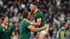 Jesse Kriel of South Africa celebrates with Eben Etzebeth the team’s victory in the Rugby World Cup Final against New Zealand in Paris. 