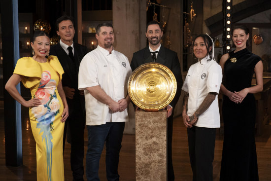 The MasterChef finalists and judge and their big shiny plate.