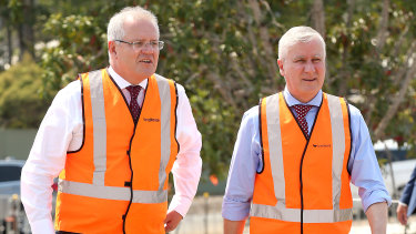 Deputy Prime Minister Michael McCormack, right, seen with Prime Minister Scott Morrison, said more Coalition seats received grants because "we hold more regional seats".