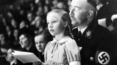 Chief of the German Police and Minister of the Interior Heinrich Himmler, with his daughter Gudrun in Berlin on March 6, 1938.