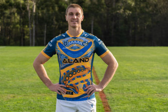 Shaun Lane models the 2022 Parramatta Indigenous Round jersey.