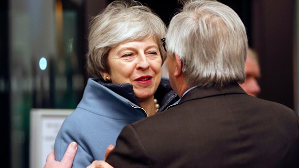 Theresa May and European Commission President Jean-Claude Juncker.