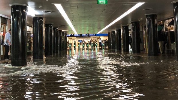 Commuters were left stranded at Flinders Street Station after a late afternoon storm saw flooding in parts of the CBD. 