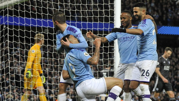 Manchester City's Gabriel Jesus is mobbed after scoring his side's third goal at Etihad Stadium.