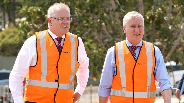 Deputy Prime Minister Michael McCormack (right), seen with Prime Minister Scott Morrison, said more Coalition seats received grants because "we hold more regional seats".