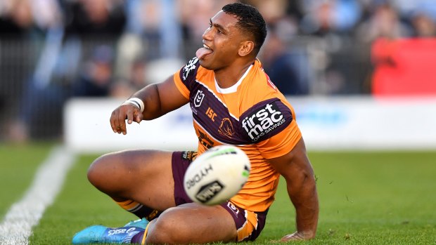Tevita Pangai Junior celebrates a try in the Broncos win over the Sharks on Sunday.